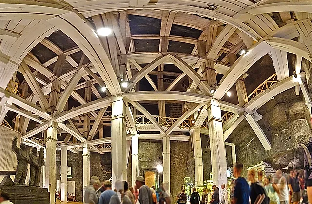 Heavy timber cribbing holding up a huge chamber of the mine