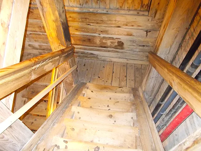 The wooden staircase that winds down into the mine